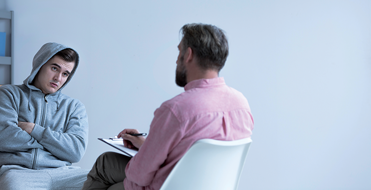 Psychologist meeting with young male client