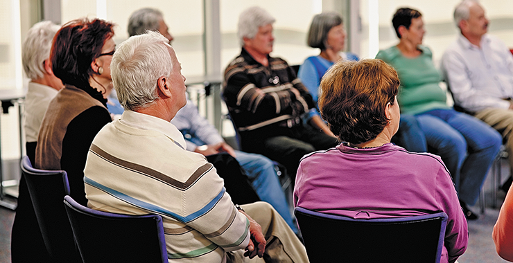 circle of people in a group therapy session