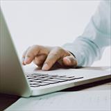Hand on a laptop