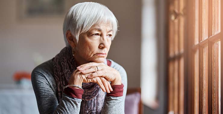 Older adult woman looking concerned