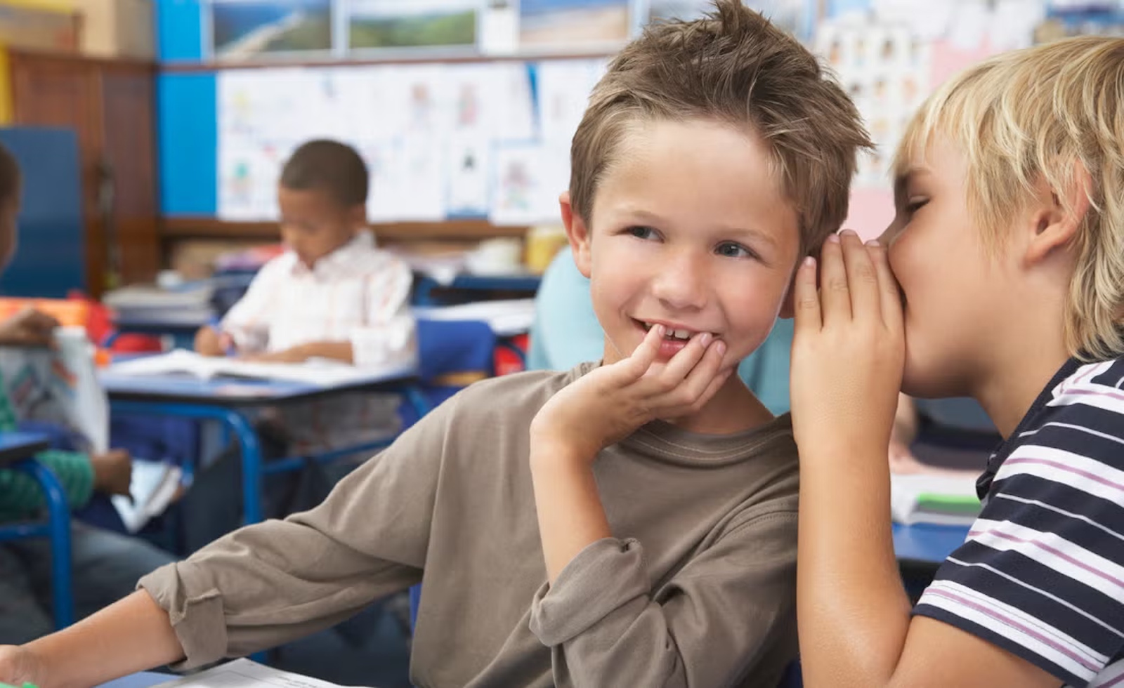 Kids whispering in class