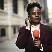 Reporter on the scene looking like she's about to drop some knowledge
