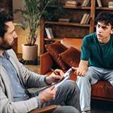 teen boy with male counselor