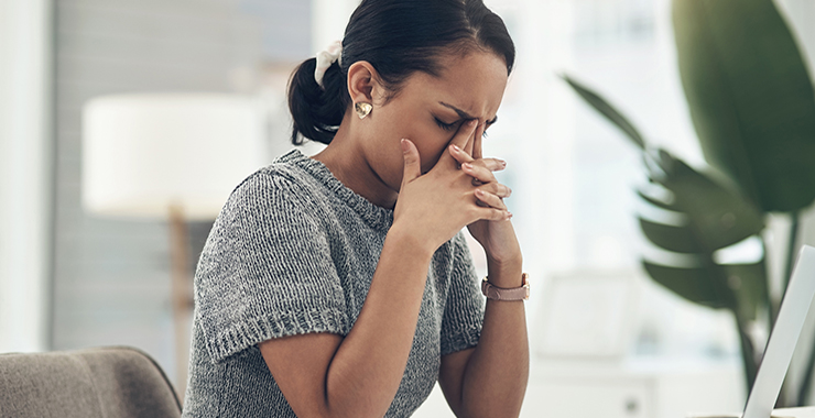 A woman looking overly stressed