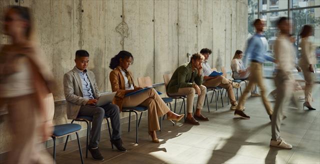 Group of business people waiting for job interview in the office