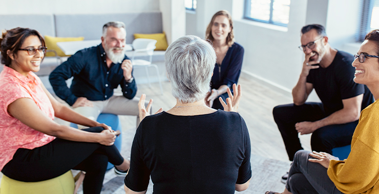 therapist and clients in group session