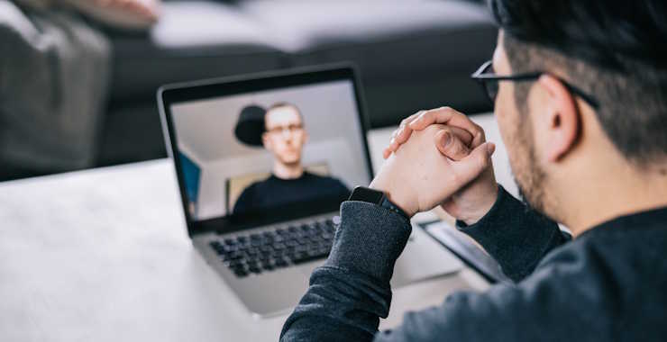 Man taking part of a video call from home 