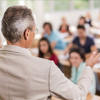 professor standing in front of class